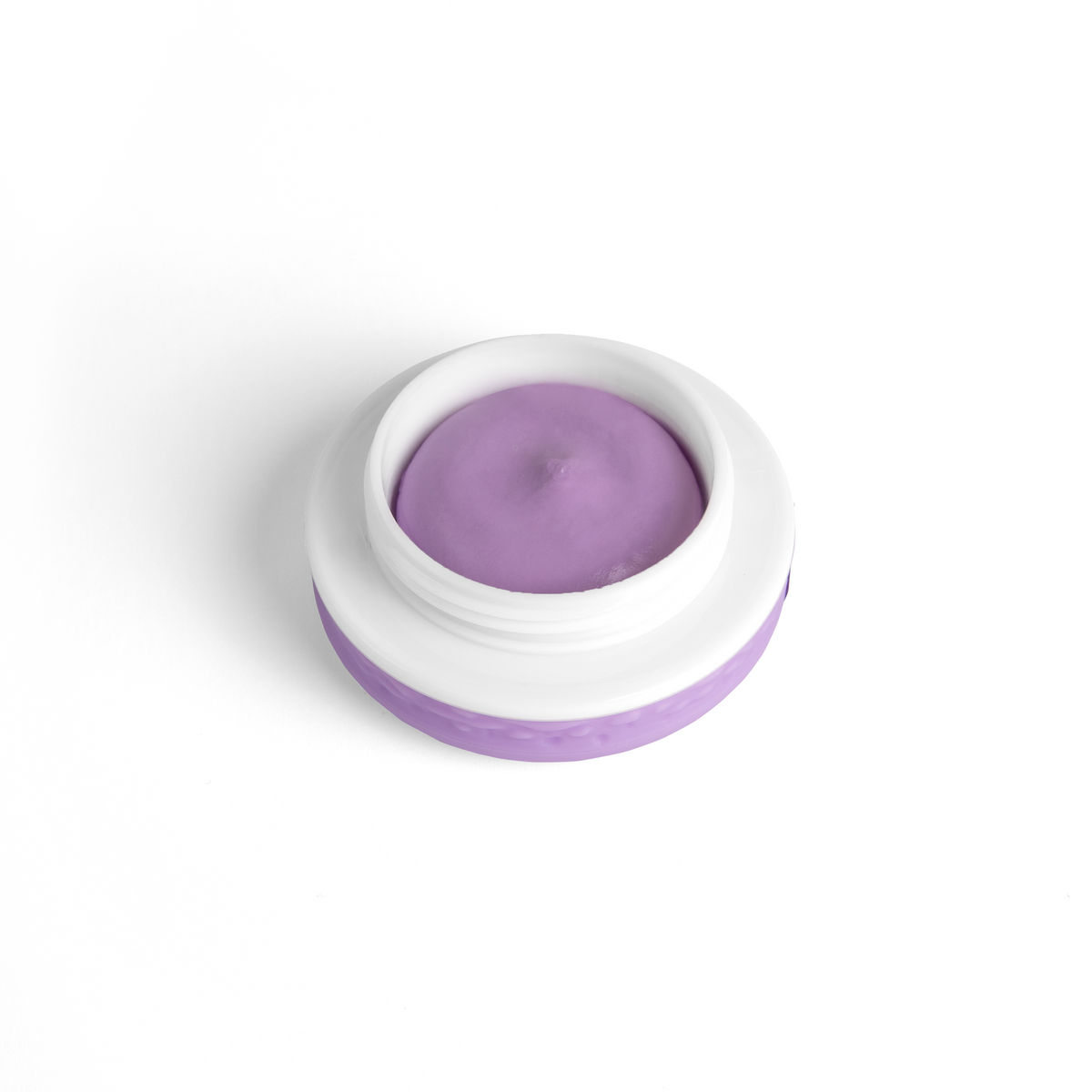 Barattolo aperto di Remover LASHY che mostra la densa texture in crema-mousse di colore viola, studiata per non colare durante la rimozione delle ciglia.