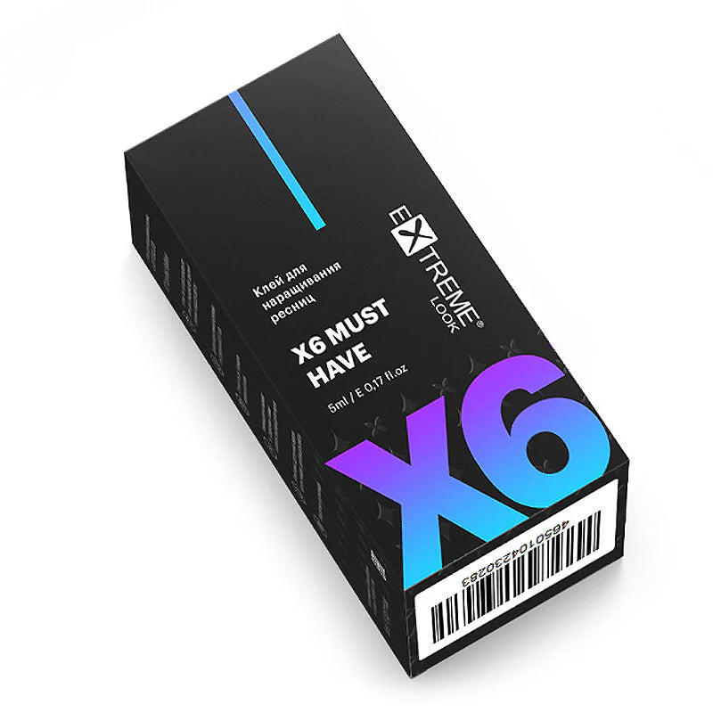 Vista isometrica della scatola nera sigillata della colla Extreme Look X6 Must Have da 5ml, con logo argentato e grande X6 sfumata viola e blu.