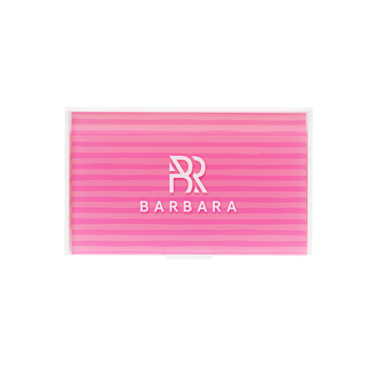 Vista dall'alto della Lashbox in acrilico BARBARA Bubble chiusa, con coperchio protettivo rosa a righe e logo del brand in bianco.