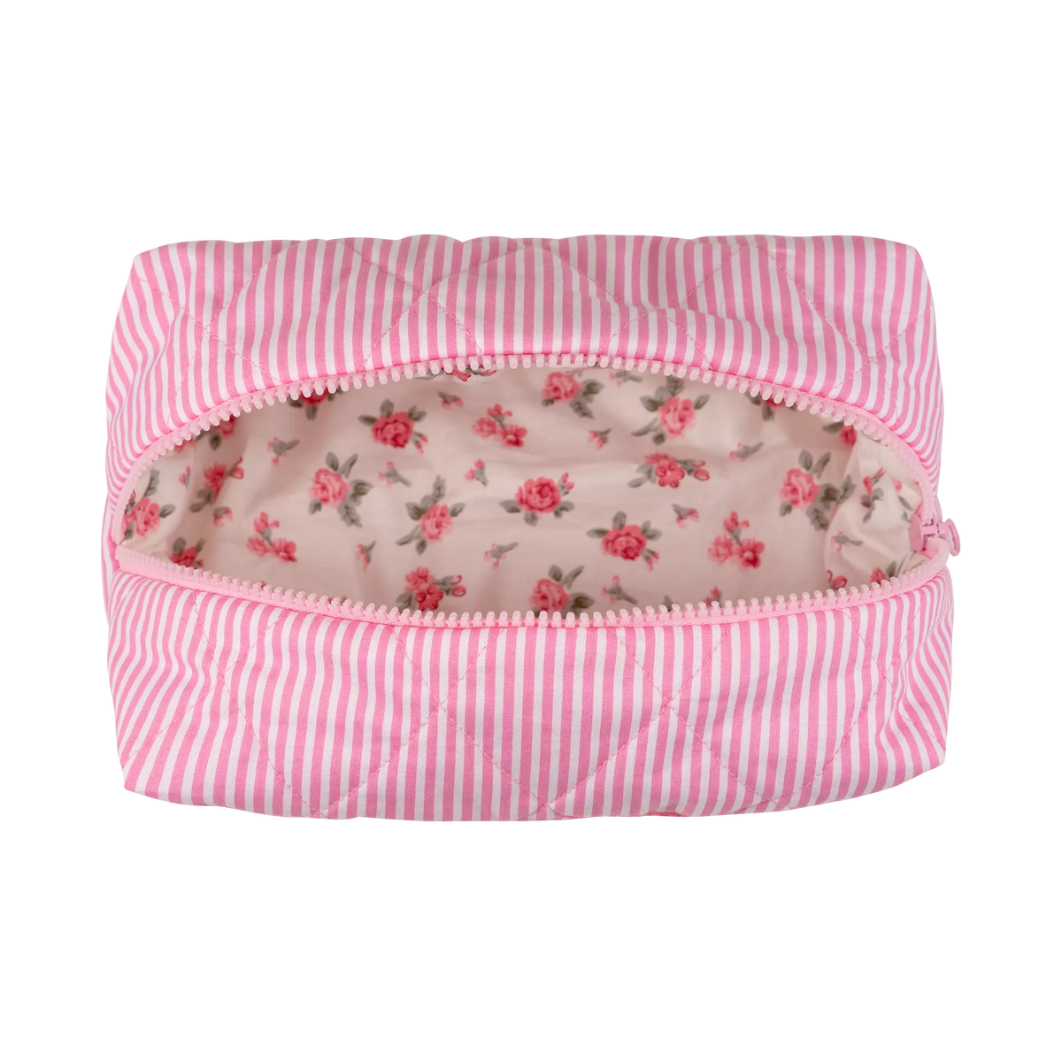 Beauty case BARBARA aperto che mostra l'ampio scomparto interno, caratterizzato da una romantica fodera con motivo floreale a rose e da una robusta cerniera rosa a denti larghi.