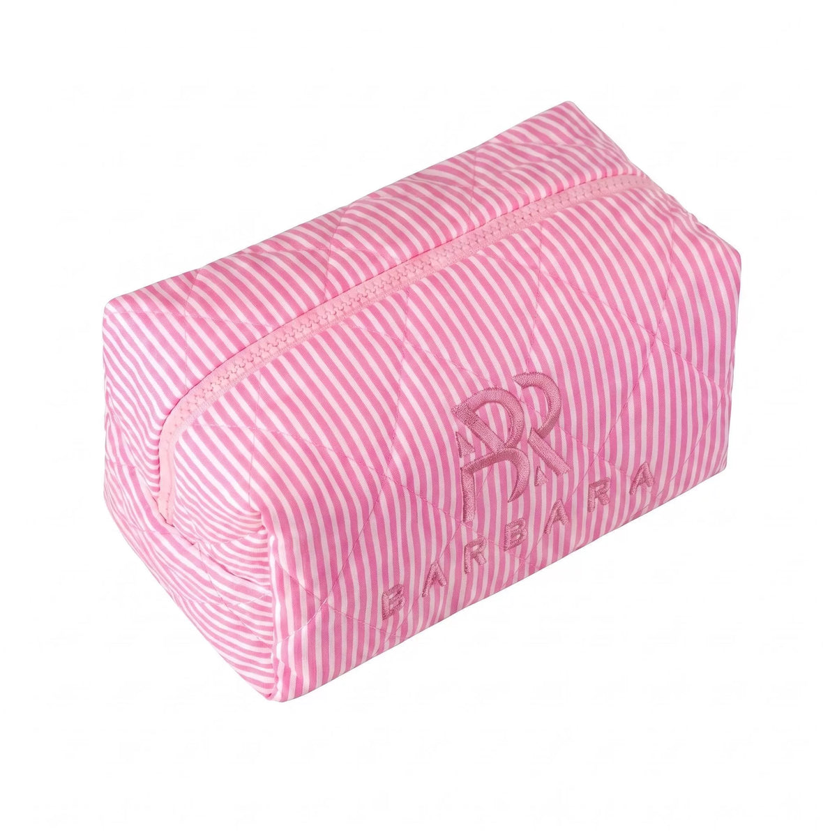 Pochette cosmetica BARBARA della collezione Bubble, vista angolata. Presenta un elegante design trapuntato a righe verticali rosa e bianche con monogramma e logo ricamati in rilievo.