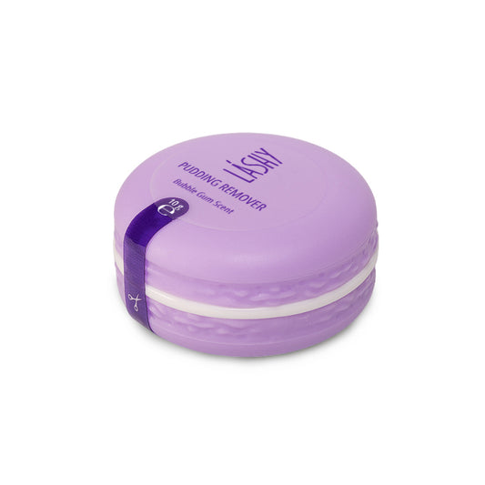 Barattolo chiuso a forma di macaron viola contenente il Remover in crema LASHY Pudding al profumo di Bubble Gum.